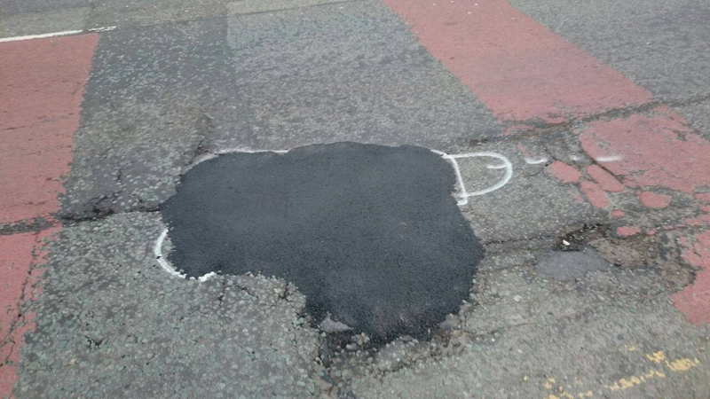 Illustration for article titled Hero Graffiti Artist Gets Potholes Fixed By Drawing Dicks On Them